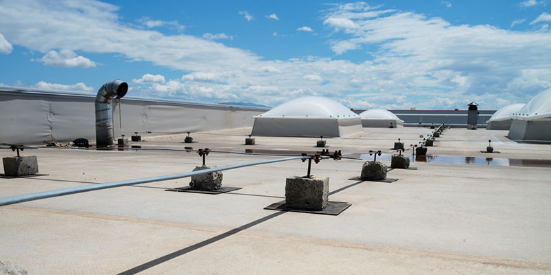 How Commercial Roof Cleaning Benefits Your Business